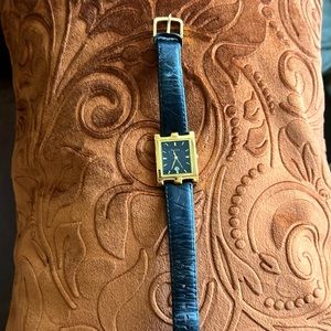 Vintage 1990’s BULOVA watch! Gold rectangular face, black leather band.